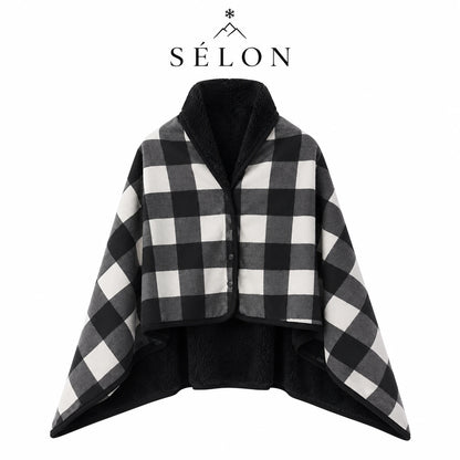 Black and white buffalo check flannel shawl laid flat with black fleece lining